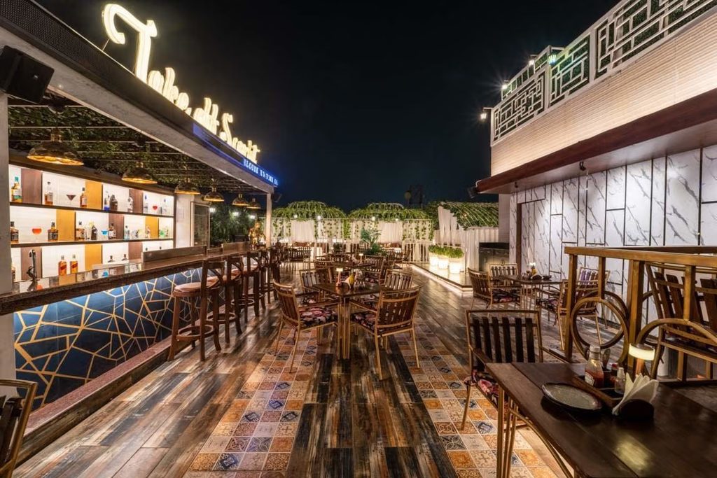 Rooftop Restaurants Delhi for Couples: 10 Romantic Places to Visit 106 TOS – Take Off Scarlet, Punjabi Bagh